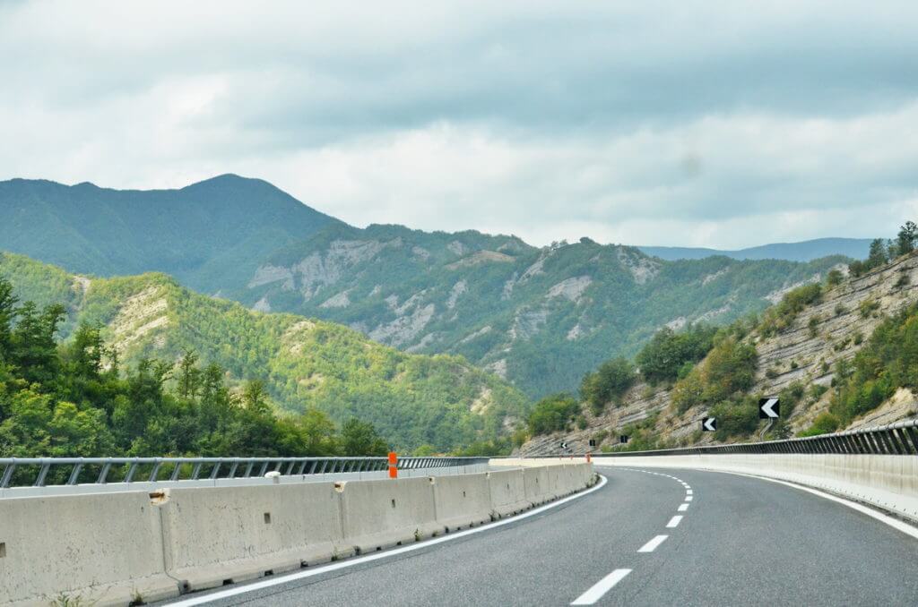 road through the hills of chianti, italy
