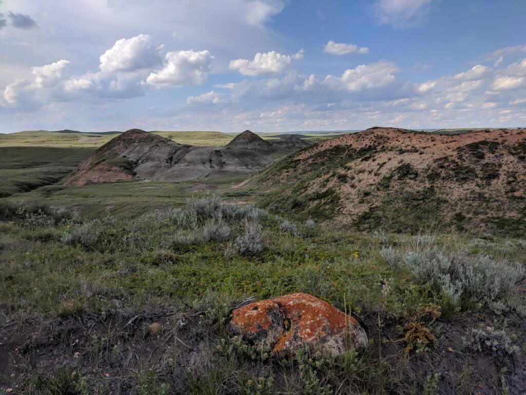 Image of red rock and soil of the badlands along the valley of 1000 devils route, grasslands national park east block, saskatchewan
