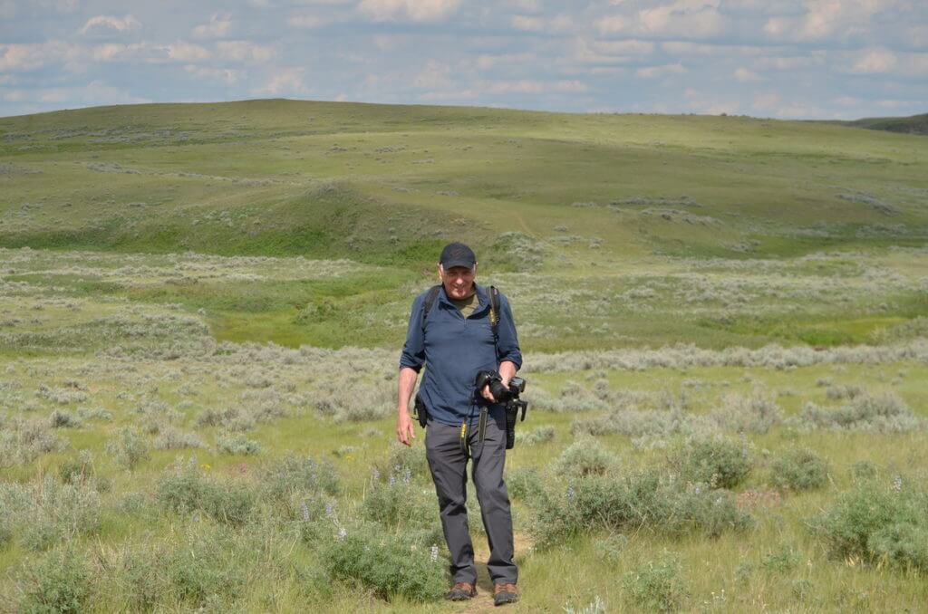 Image of bob hiking the valley of 1000 devils route at grasslands national park east block, saskatchewan