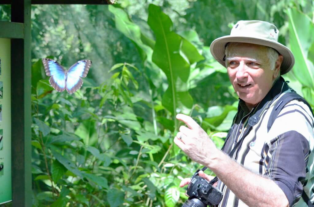 bob with a blue morpho butterfly, ecocentro danaus, la fortuna, costa rica 
