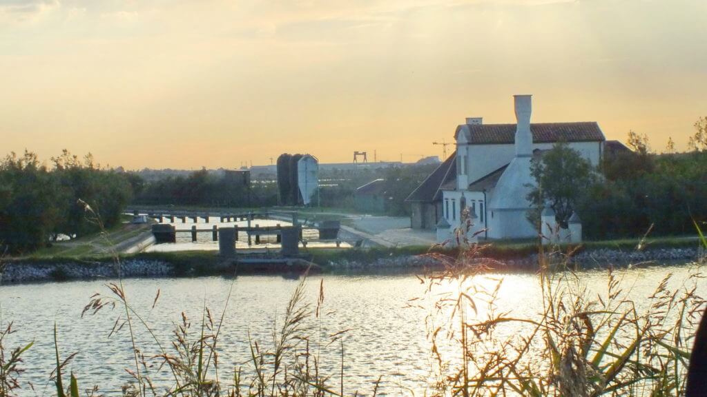 control gates of a canal, parco regionale veneto del delta del po, po river delta, italy 