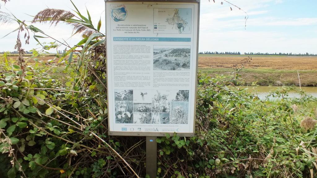 an interpretive sign, oasi di ca' mello, oasis of ca' mello, parco regionale veneto del delta del po, po river delta, italy 
