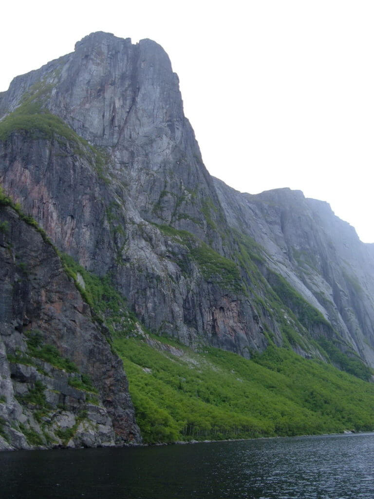 steep cliffs of the fjord, western brook pond, gros morne national park, newfoundland, canada