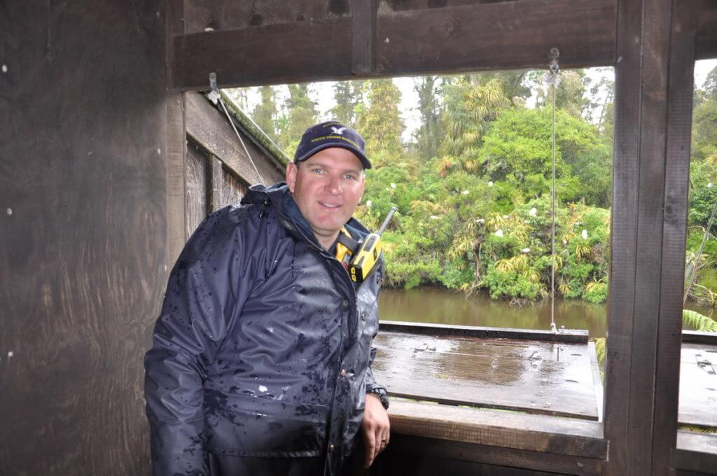 dion inside the bird hide, white heron sanctuary. south island, new zealand