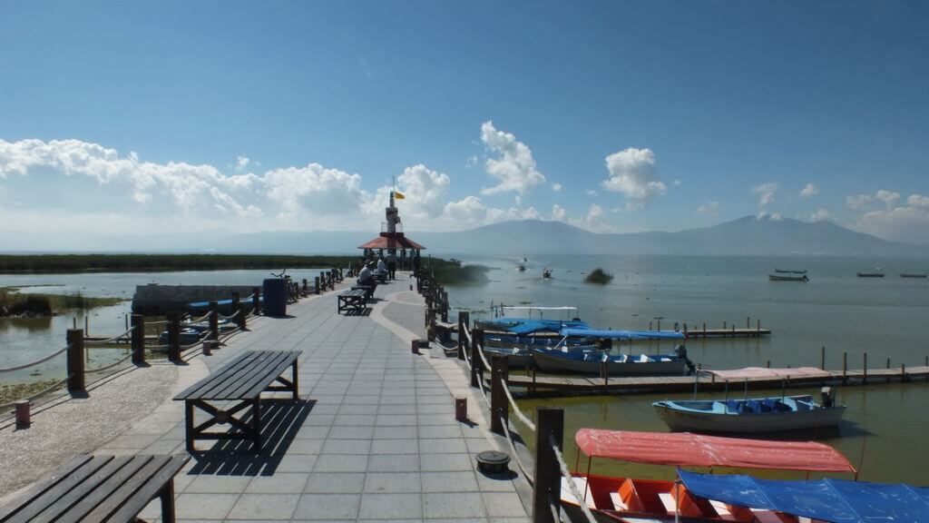 tour boats along a pier, lake chapala, mexico