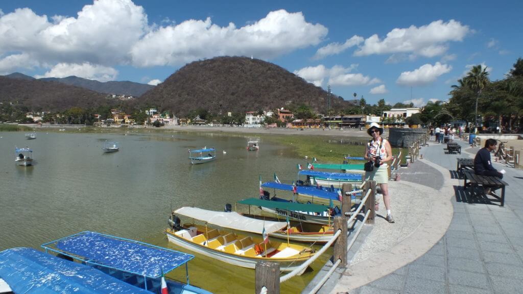 boats for hire along a pier, lake chapala, mexico