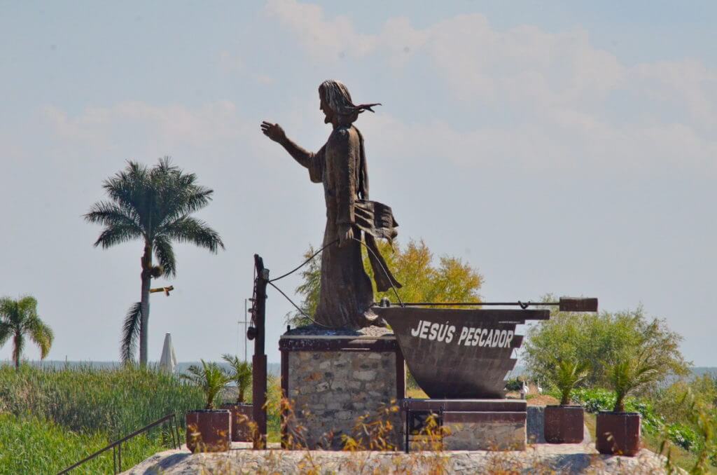 statue of jesus blessing the fishermen, lake chapala, mexico