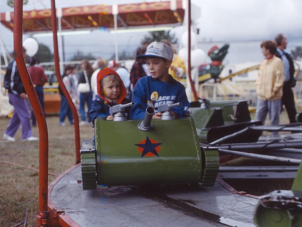 children on a kiddie ride, markham fair, 1990