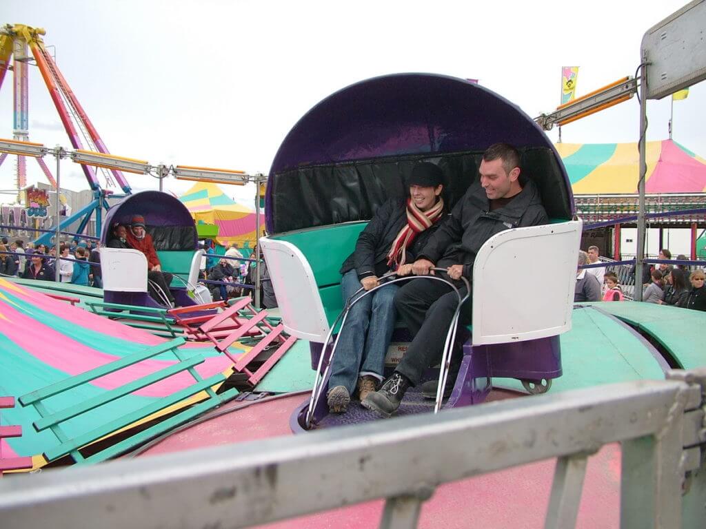 people on a ride at the midway, markham fair, markham, ontario, 2010