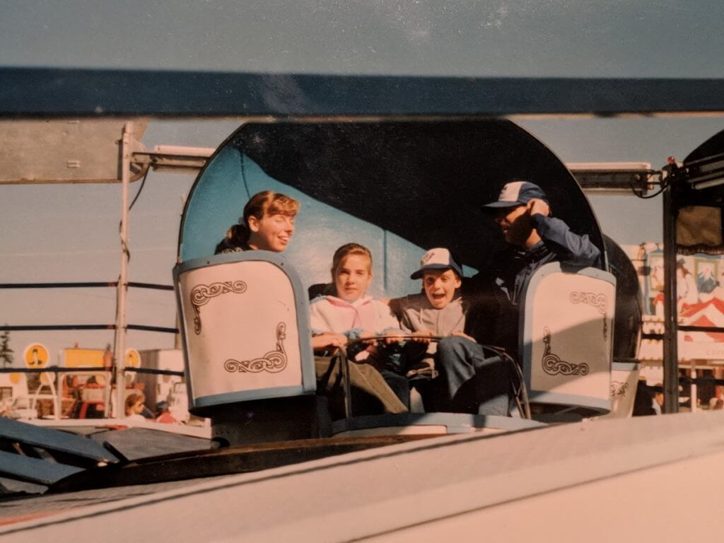 family riding the Tilt-a-whirl, markham fair, early 1990s