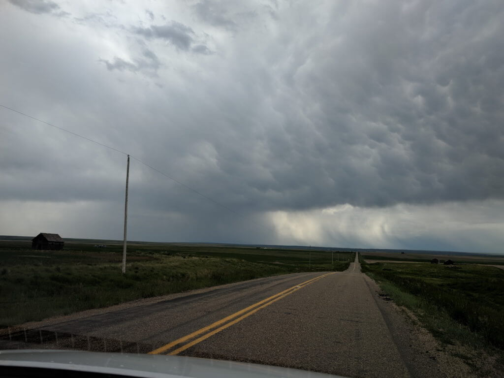 Image of looming storm clouds forming above grasslands national park, saskatchewan