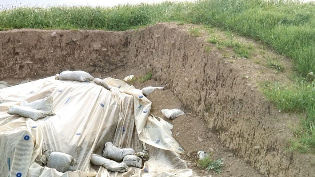 maintenance work on the mound of the hostages, the hill of tara, county meath, ireland