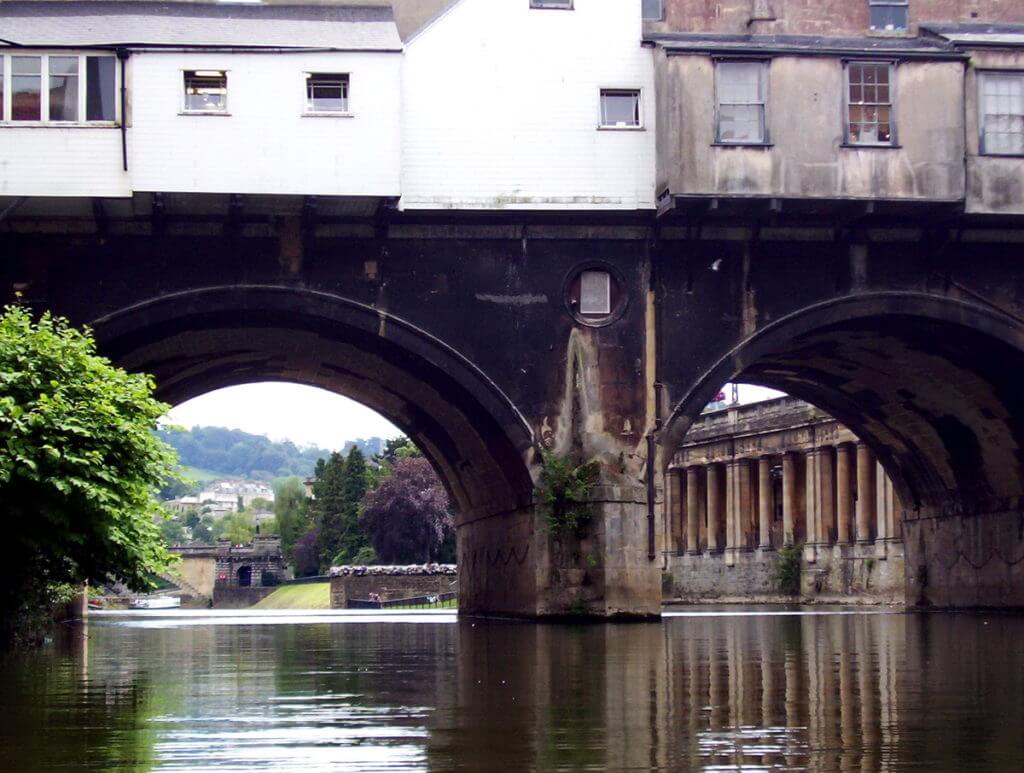 pulteney bridge and empire hotel, avon river, bath, england
