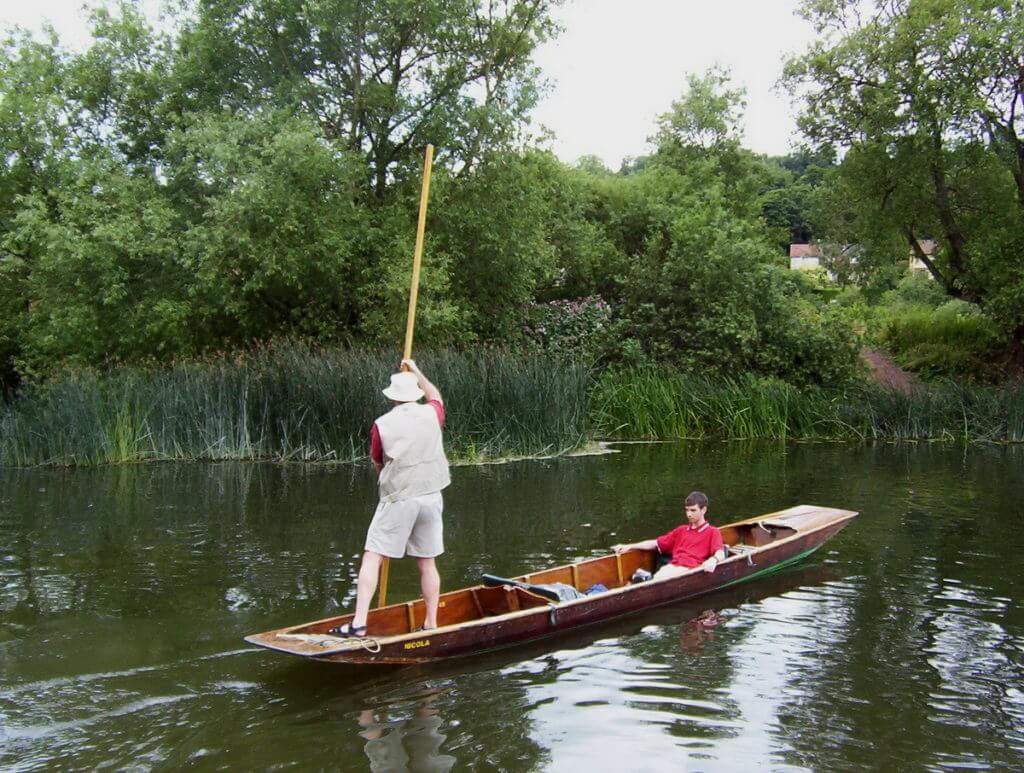 bob punting on the avon river, bath, england