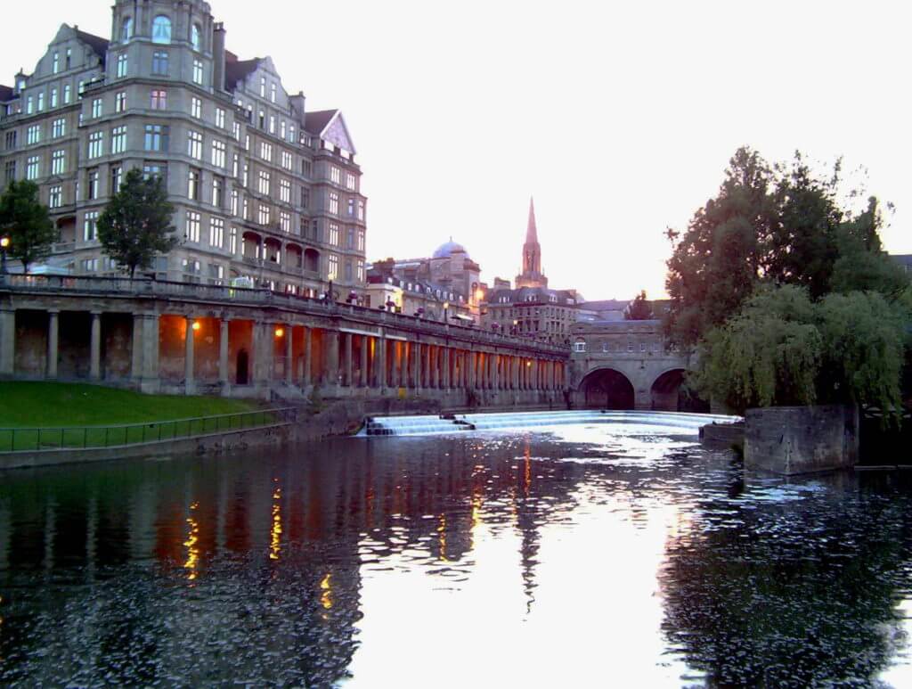 empire hotel and pulteney bridge weir, bath, england