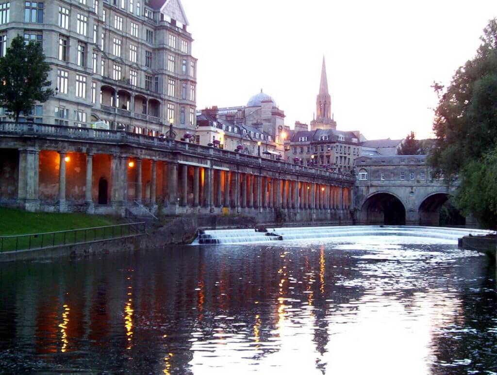 empire hotel and pulteney bridge weir, bath, england
