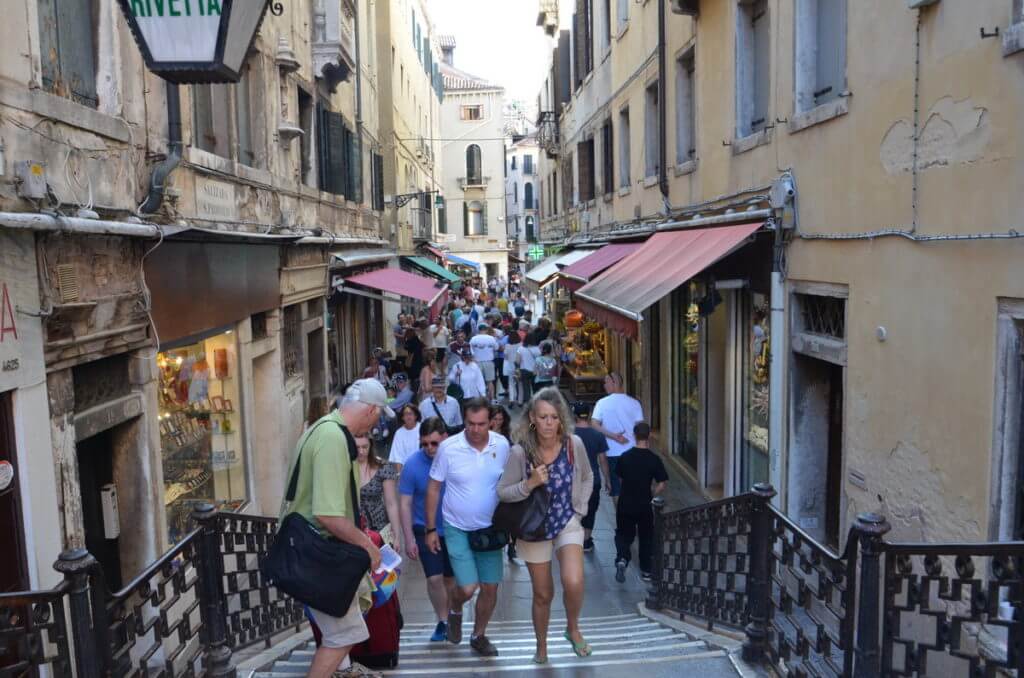 crowded alley, venice, italy