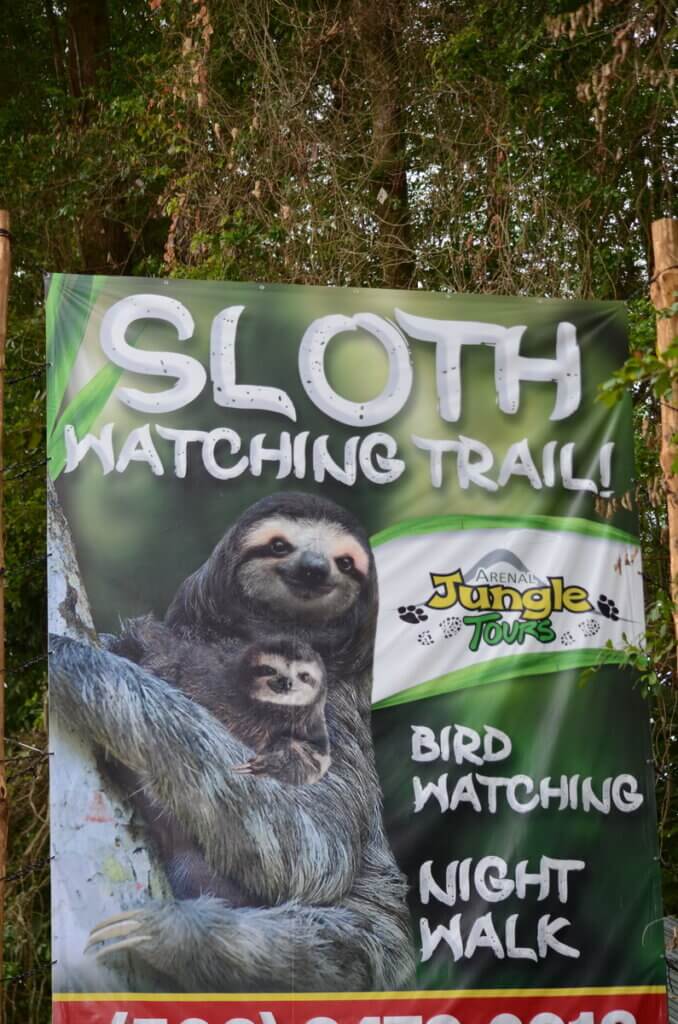 sign for sloth walk, la fortuna, costa rica