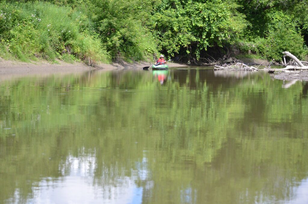Image of kayaker on Duffins Creek in Ajax, Ontario, Canada.