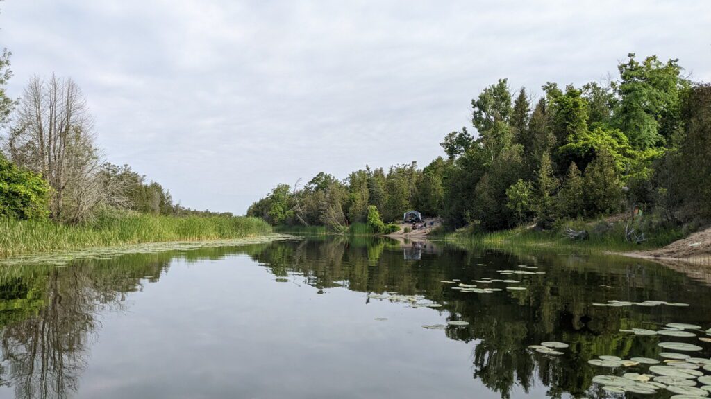 image of the outlet river in sandbanks provincial park, ontario