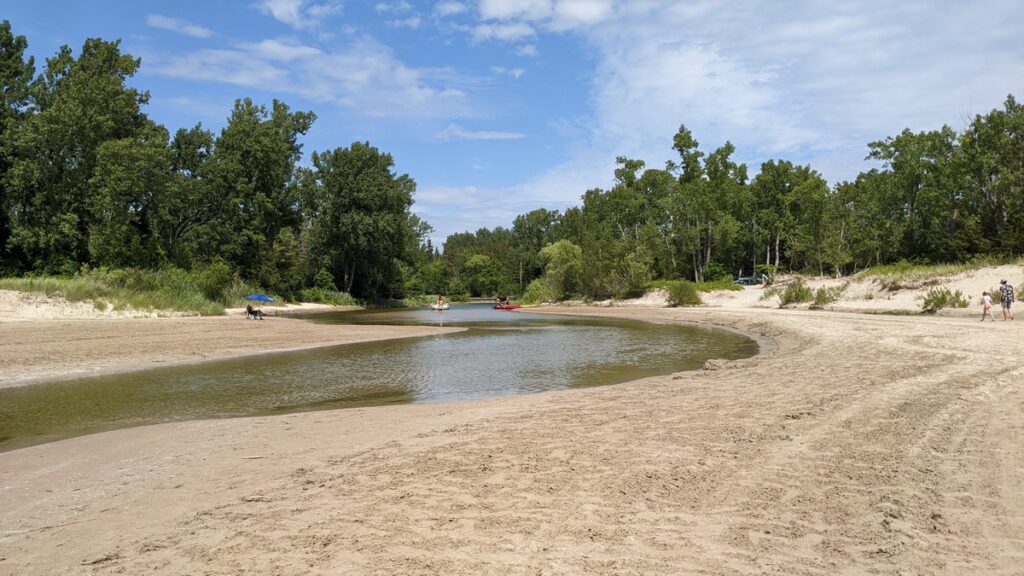 image of outlet river mouth at lake ontario, sandbanks provincial park, ontario