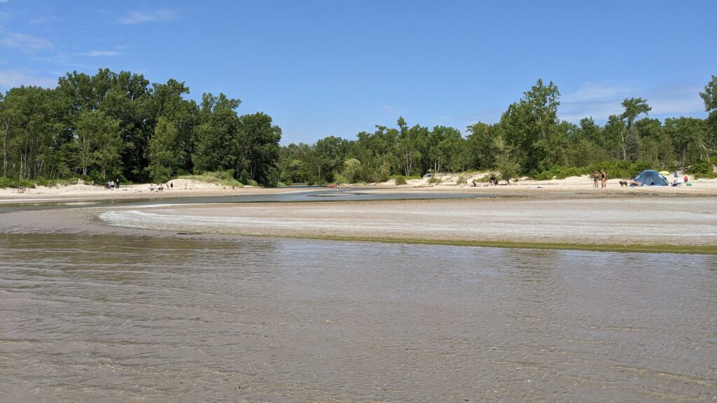 image of outlet river mouth and beach at sandbanks provincial park, ontario