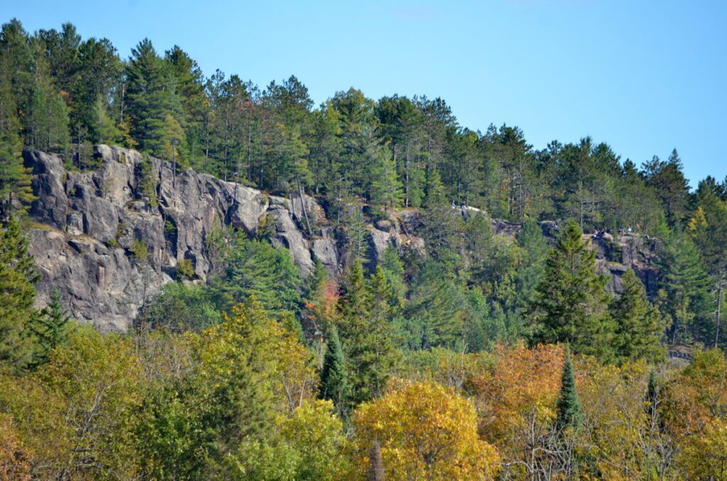 Image of Centennial Ridges Trail Lookout from a canoe on Whitefish Lake in Algonquin Park.