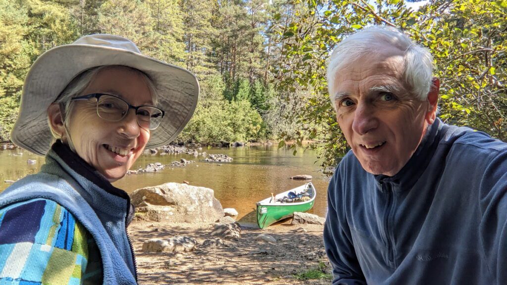 Image of Bob and Jean beside their canoe in Algonquin Park.