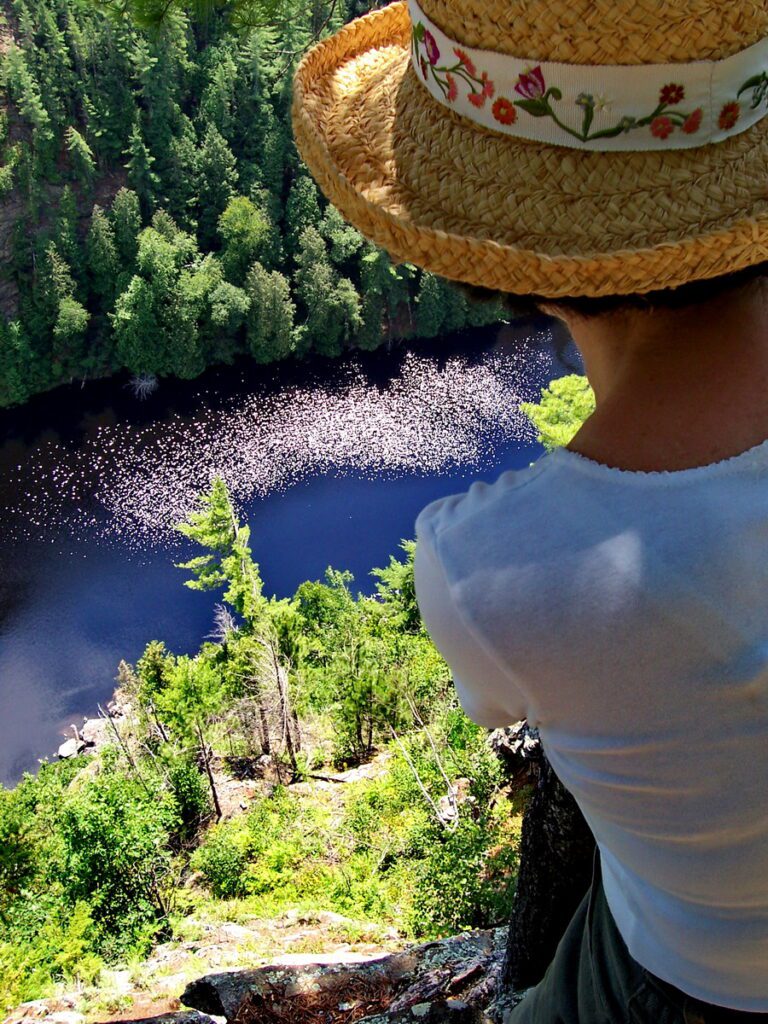 Image of Jean standing above Barron Canyon in Algonquin Park, Ontario, Canada. A popular canoeing route..