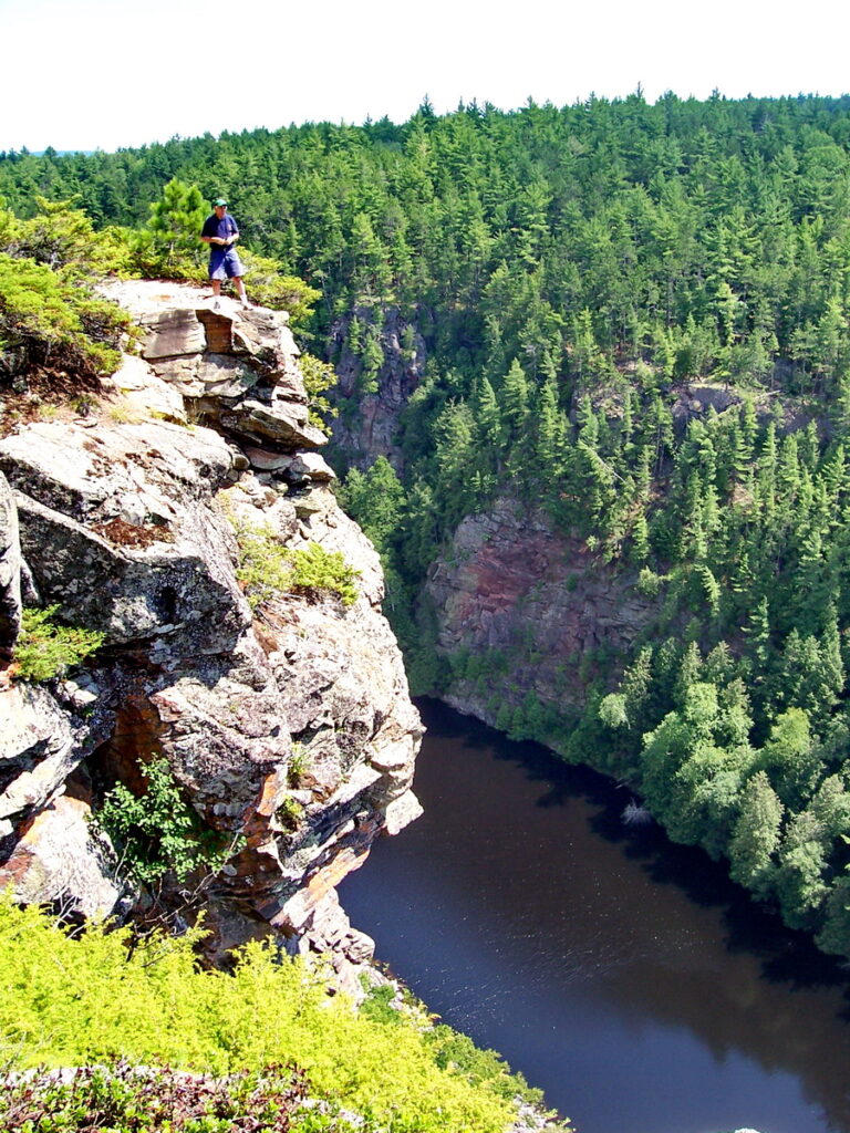 Image of Bob standing above Barron Canyon in Algonquin Park, Ontario, Canada. A popular canoeing route..