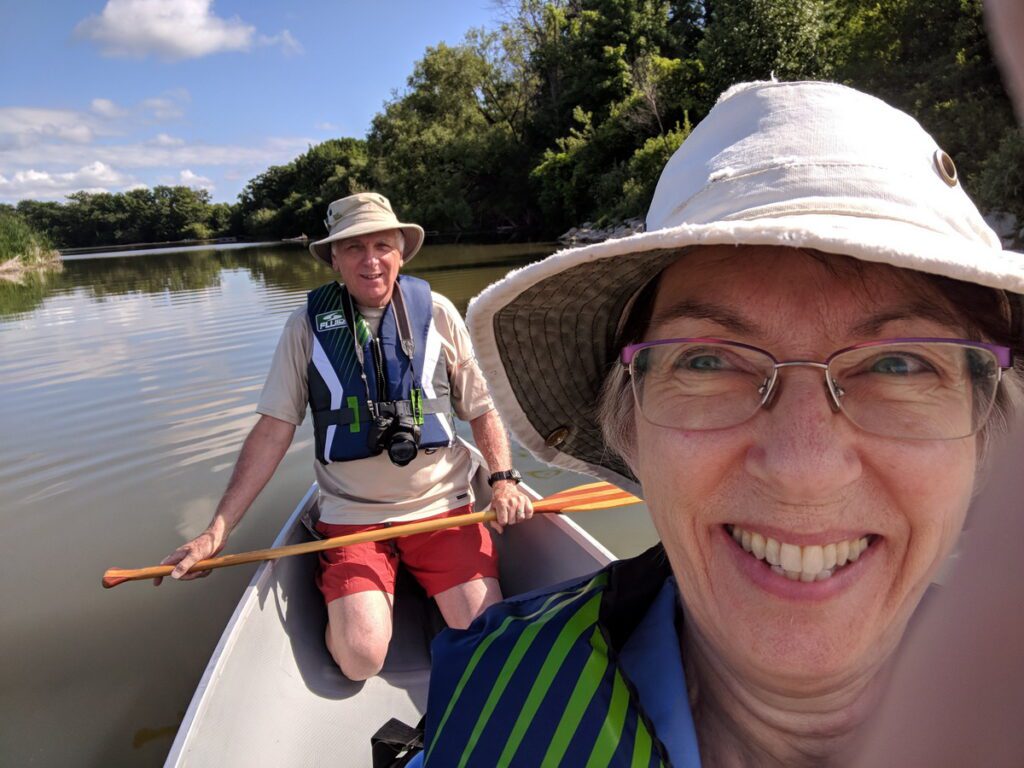 Image of Jean and Bob canoeing on Duffins Creek in Ajax, Ontario, Canada.