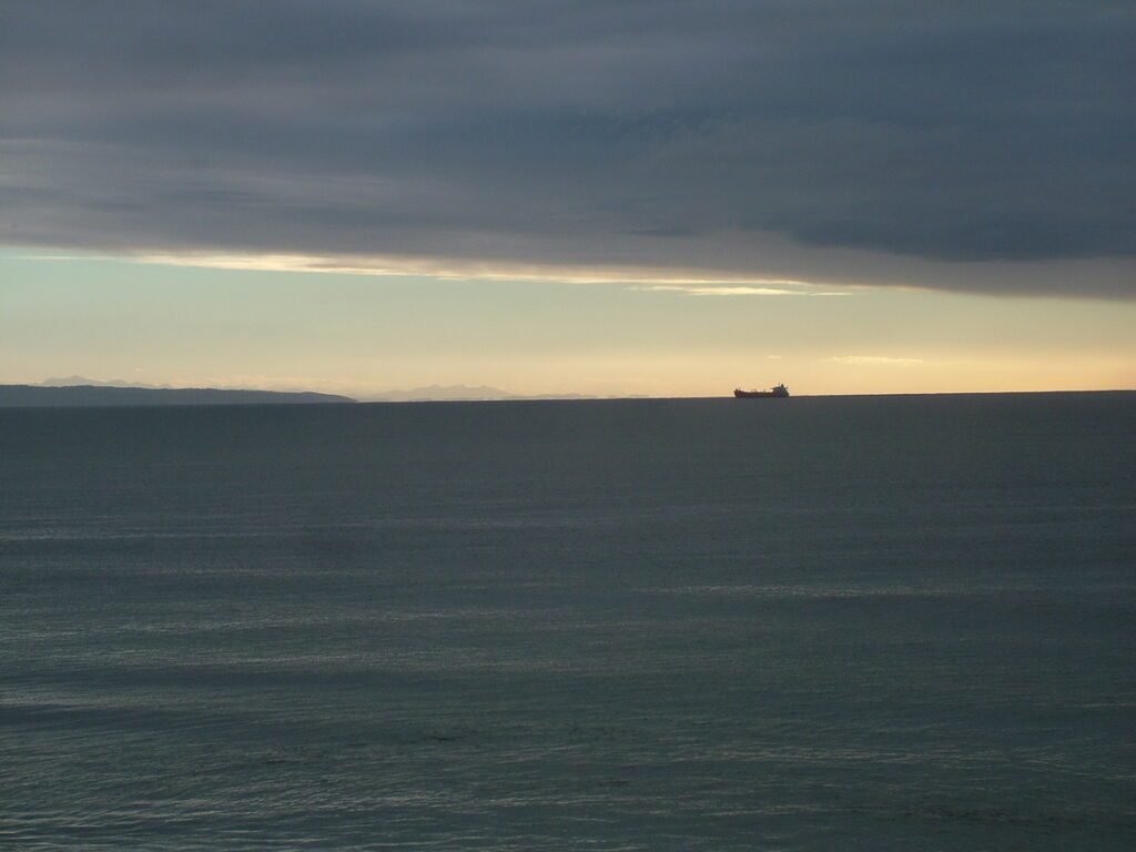 image of a freighter at dawn, mossel bay, south africa