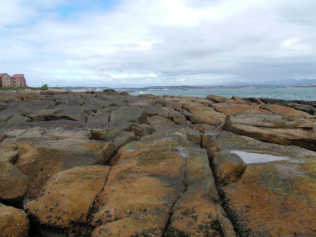 image of rocky shore, mossel bay, south africa