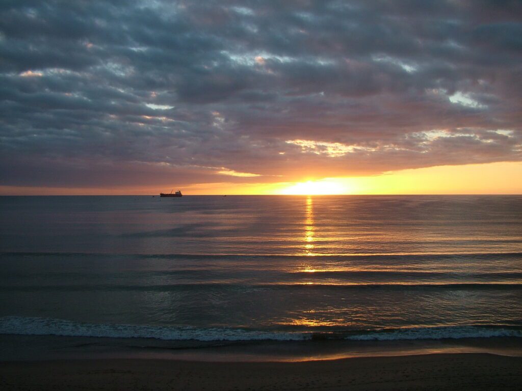 image of orange sunrise, mossel bay, south africa