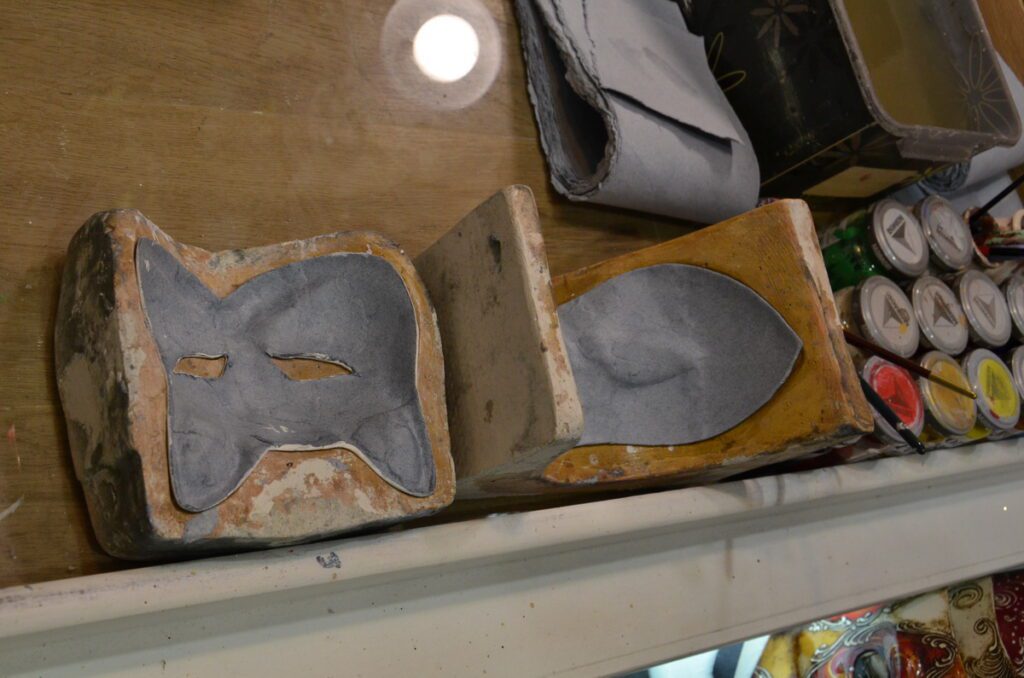 image of columbina mask molds, venice, italy