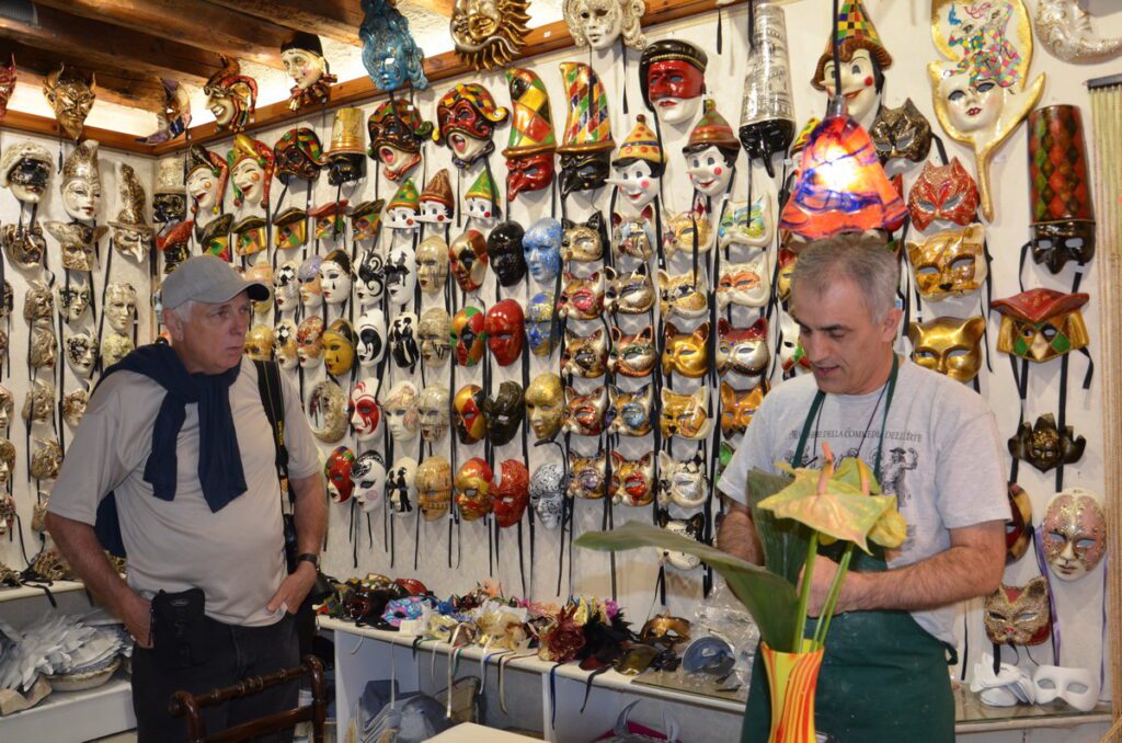 image of bob observing a mascherari, mask maker, venice, italy