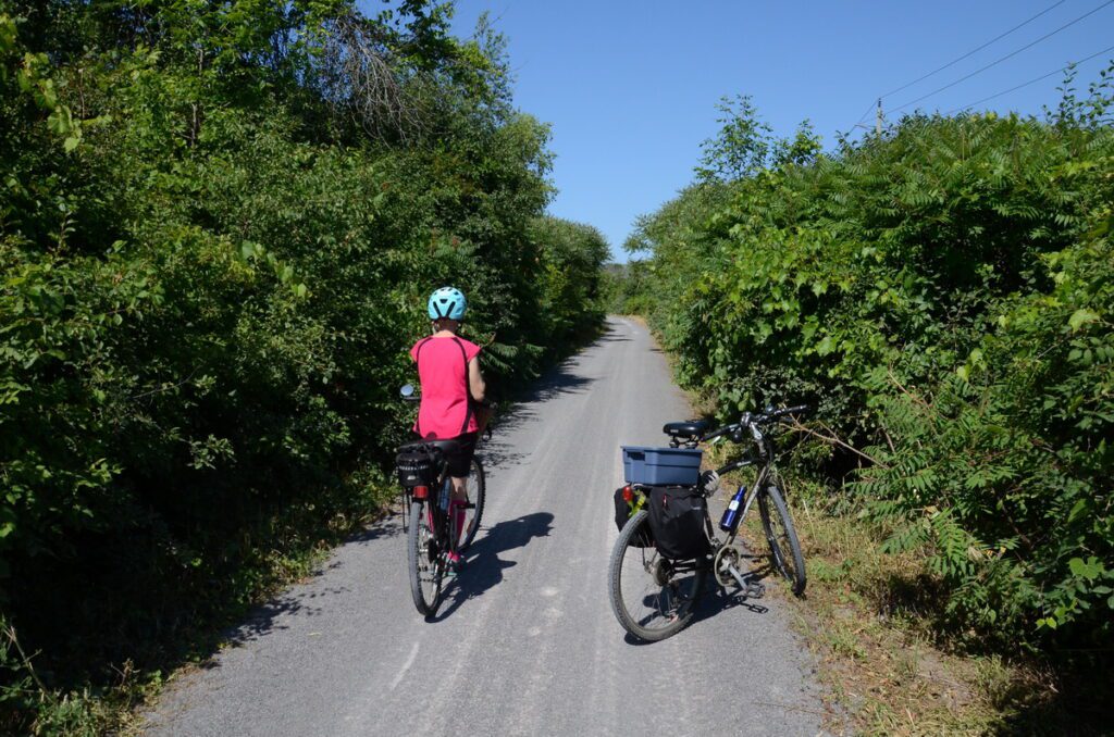 image of jean cycling, millennium trail, prince edward county, ontario