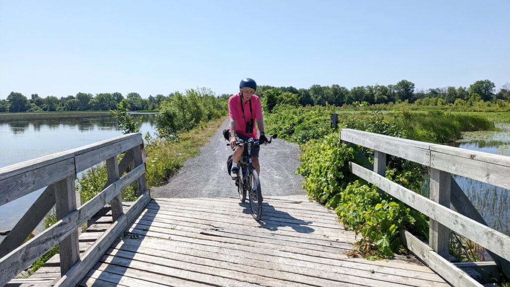image of bob on his bike, consecon lake, millennium trail, prince edward county, ontario