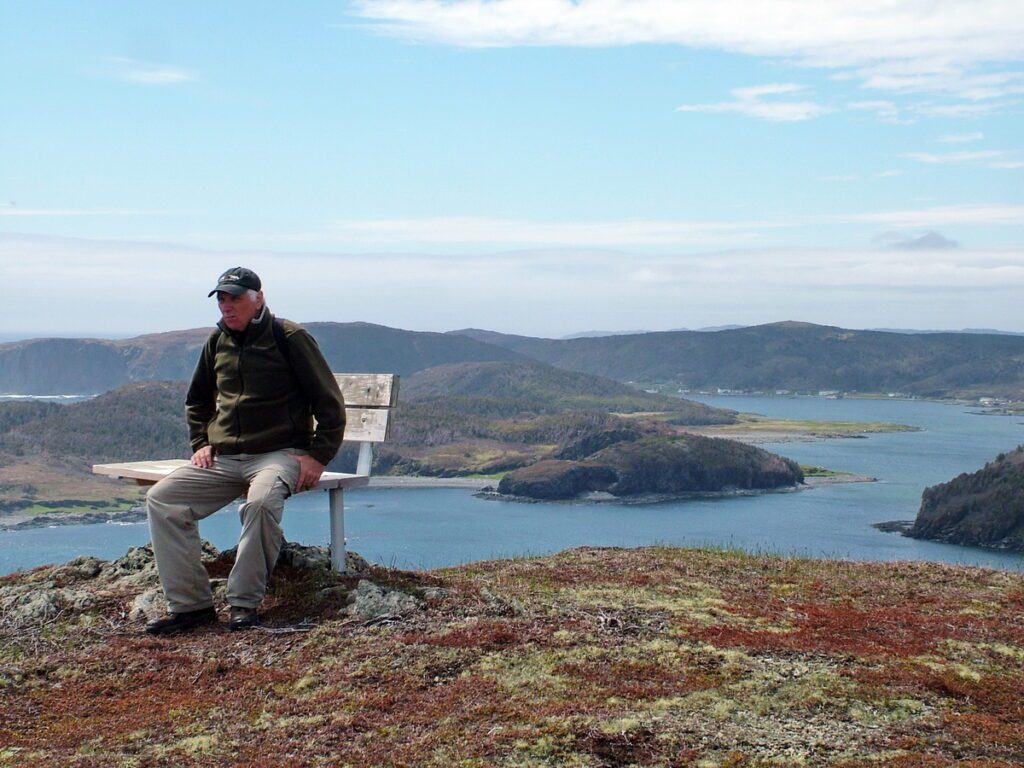 image of bob on a bench, camel's back trail, camel island, newfoundland