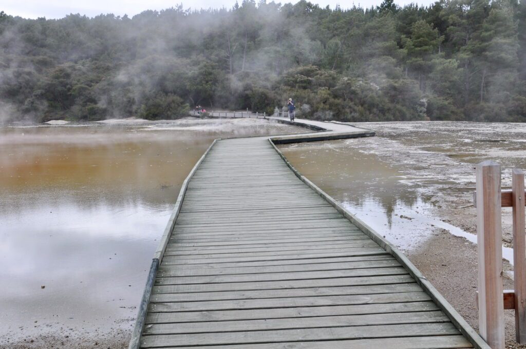 image of a boardwalk across artist's palette, wai-o-tapu thermal wonderland, new zealand