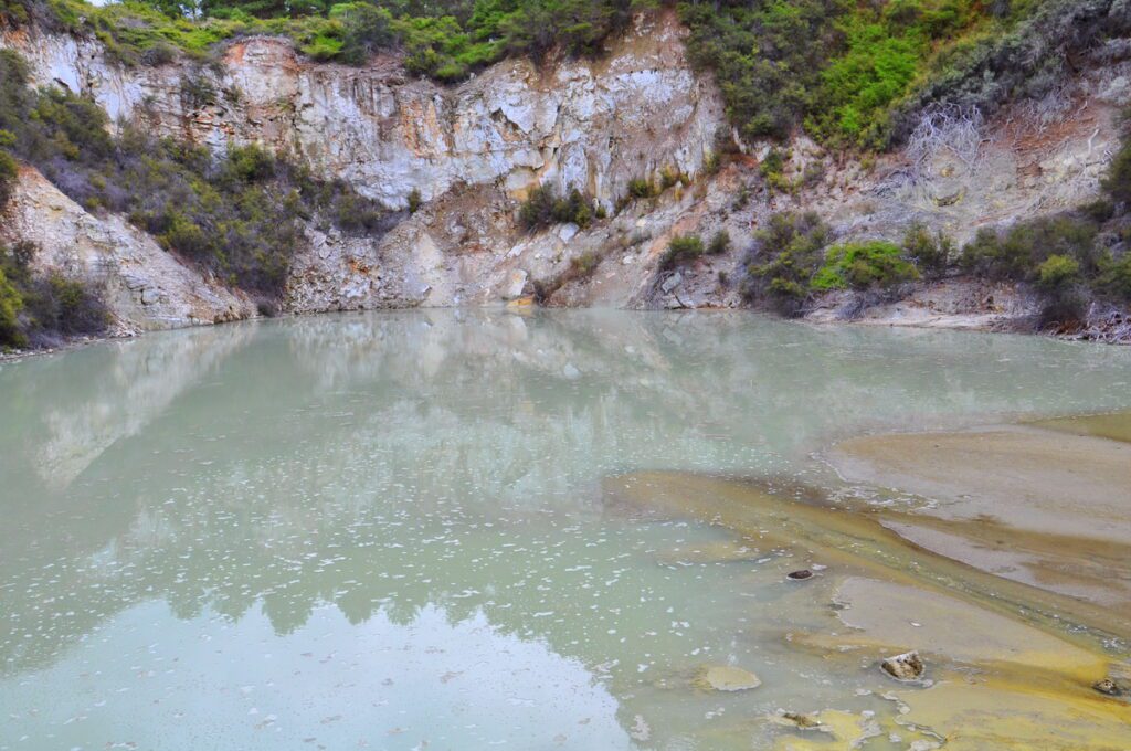 image of a milky pool at the alum cliffs, wai-o-tapu thermal wonderland, new zealand