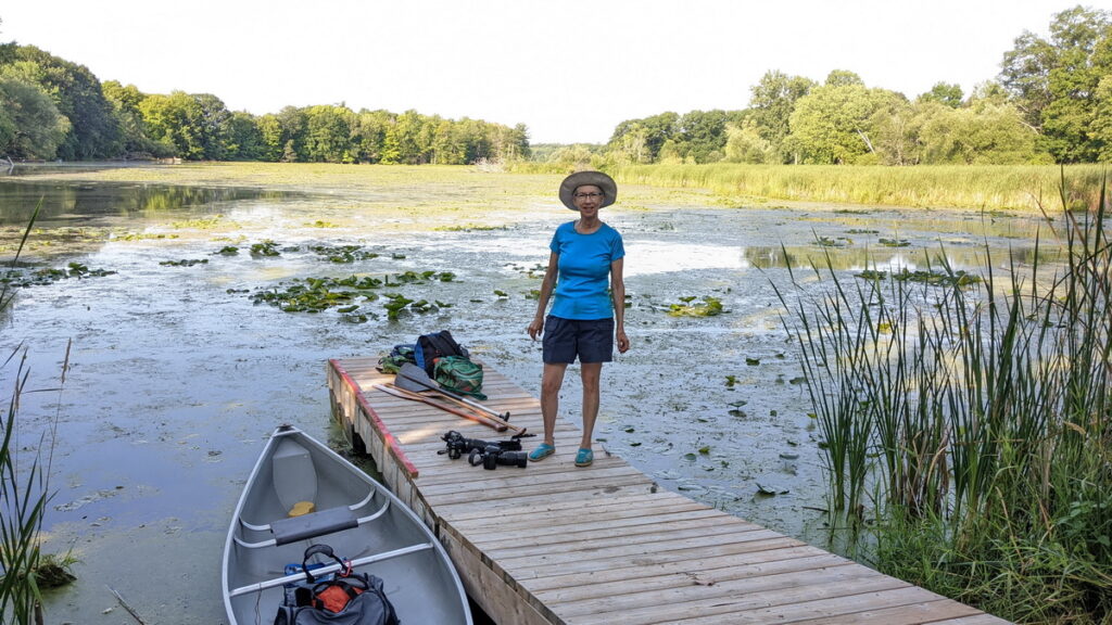 image of jean on the dock, cabin fever kayak, black river, prince edward county, ontario