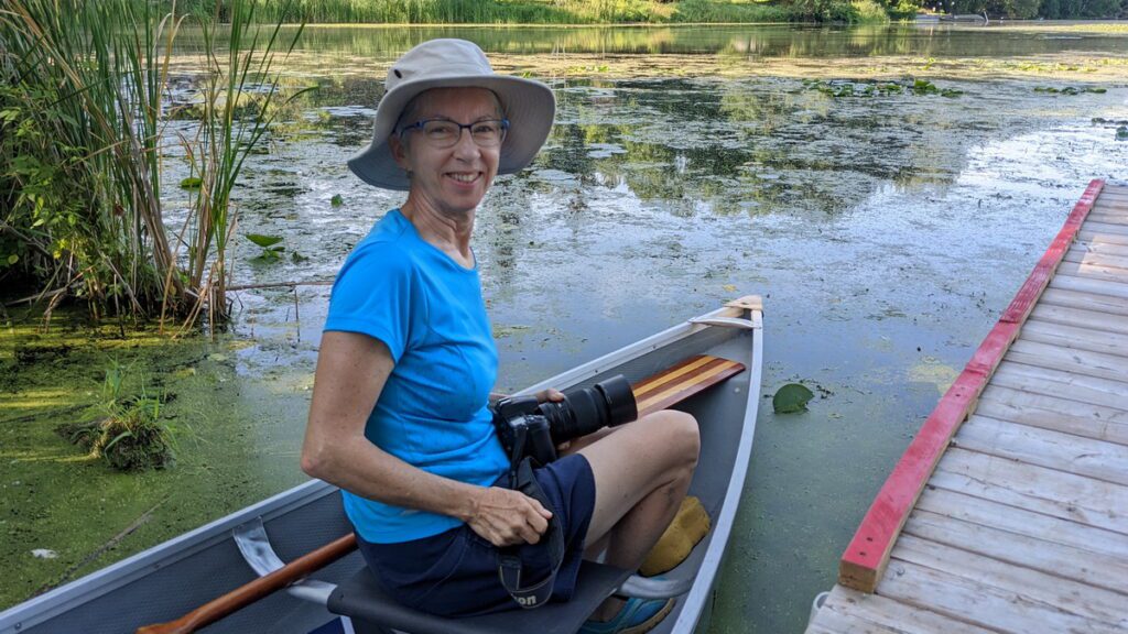 image of jean in our canoe, black river, prince edward county, ontario