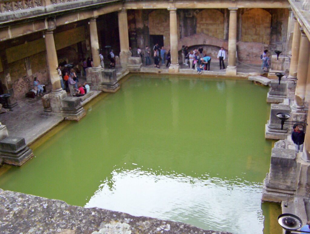 image of the great bath and diving stone, roman baths, bath, England
