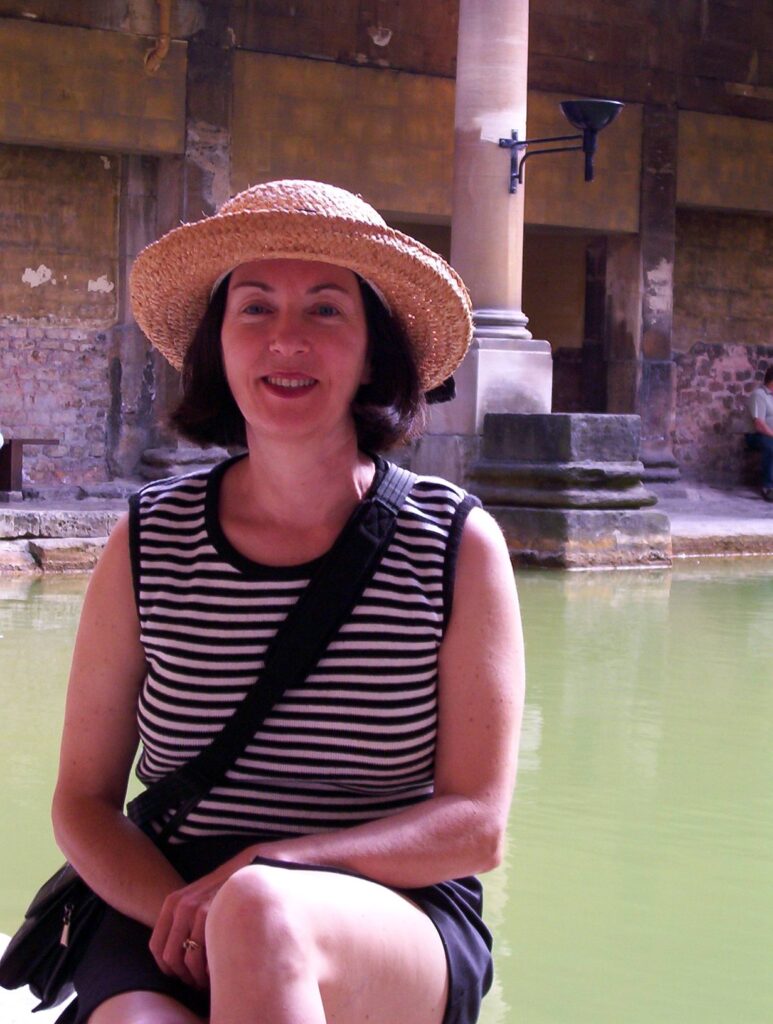 image of jean at the great bath, roman baths, bath, England