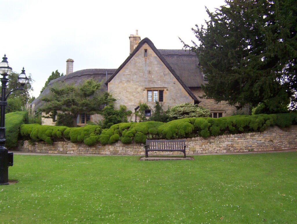 image of contoured and manicured hedge, chipping campden, england