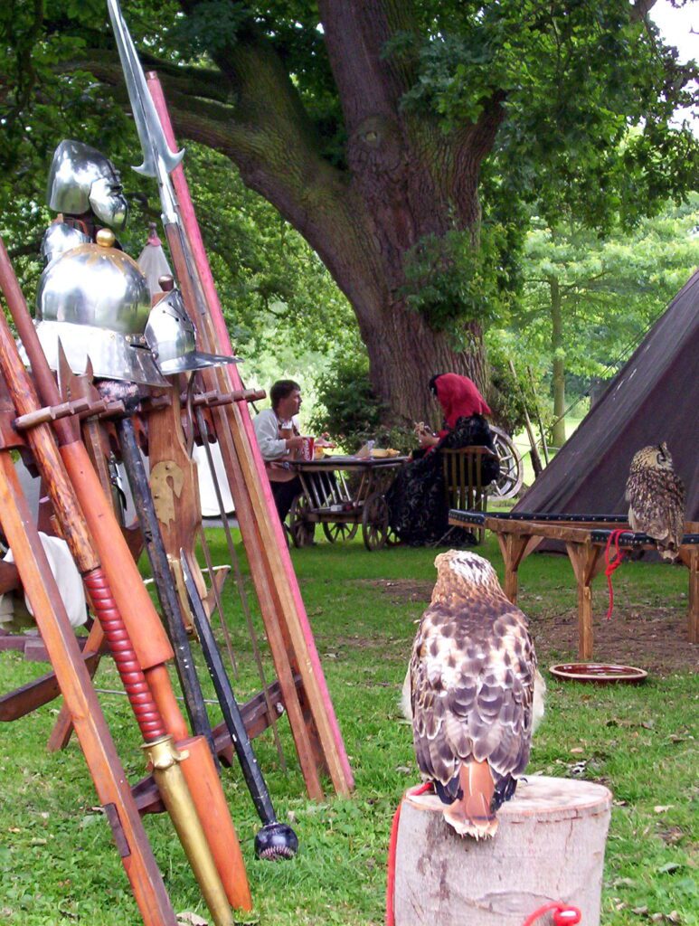 image of falconers taking a break, warwick castle, england