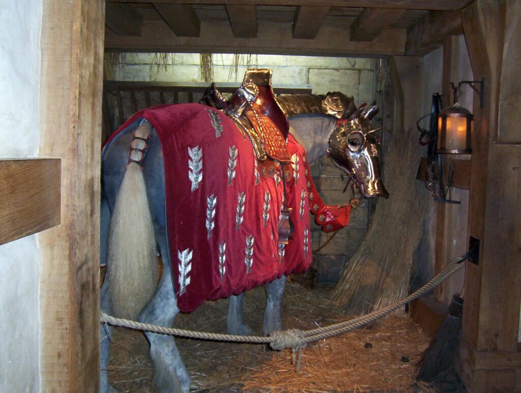 image of a horse in jousting attire, warwick castle, england