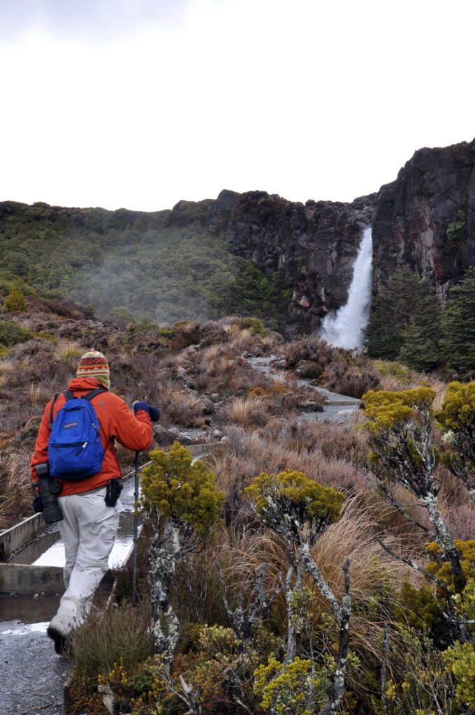 image of bob approaching taranaki falls, Mt. Tongariro National Park, New Zealand