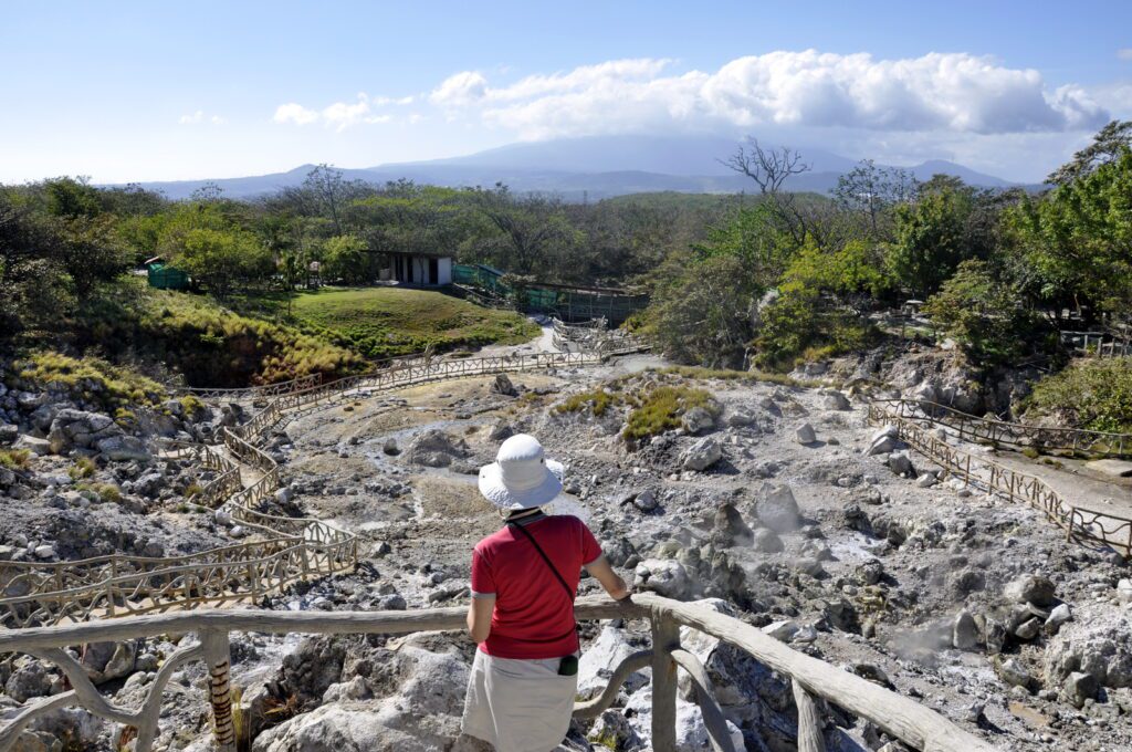 image of jean overlooking the crater, las hornillas volcanic activity centre, miravalles volcano, costa rica 